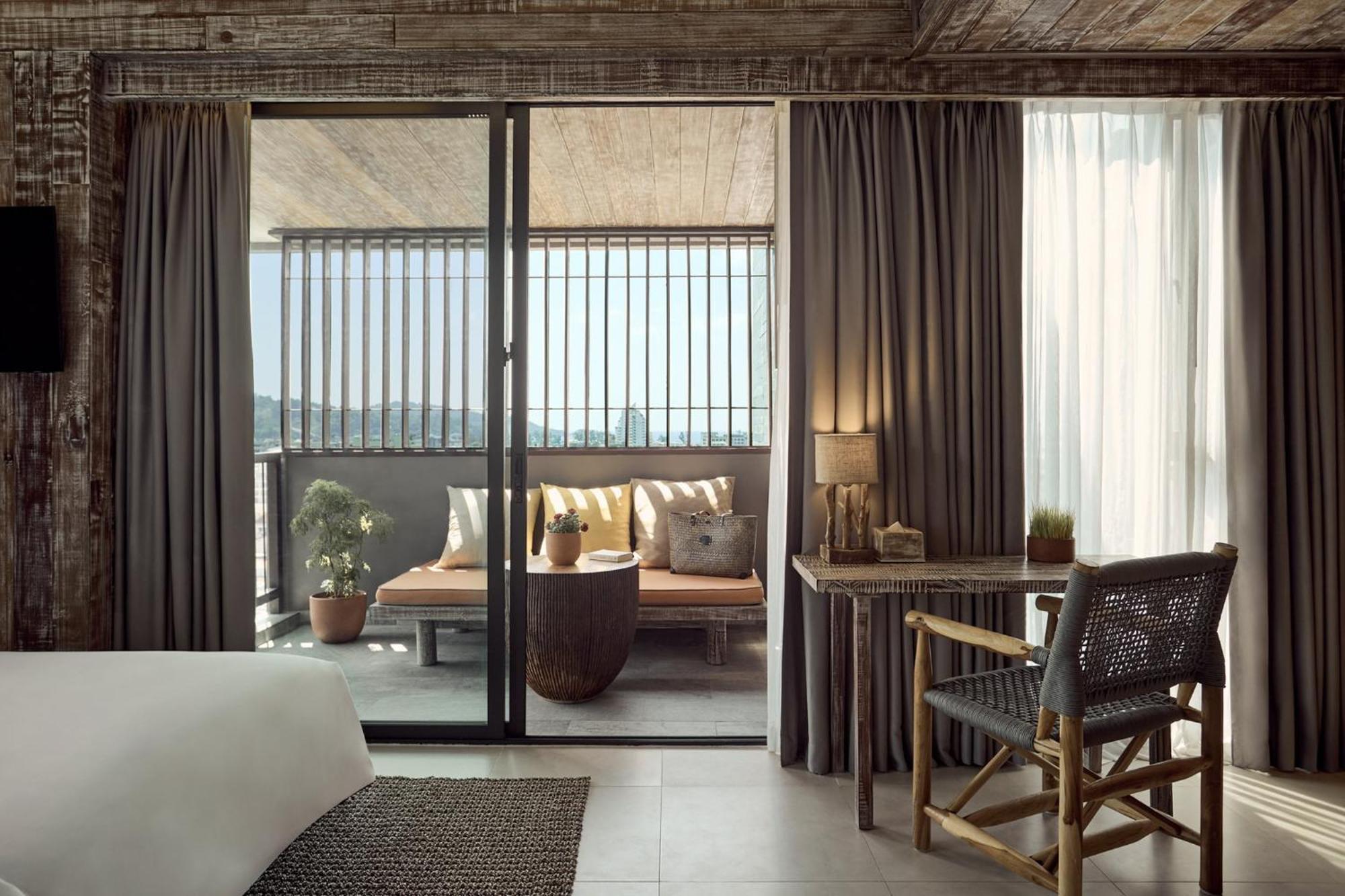 Dinso Resort & Villas Phuket, Vignette Collection By Ihg Patong Exterior foto A room at the hotel